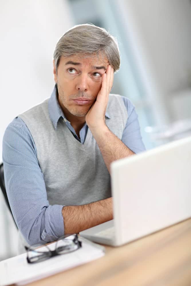 Senior businessman with worried expression